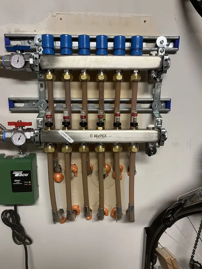 Plumber performing Gas Line Installation at a residential property in Naranja